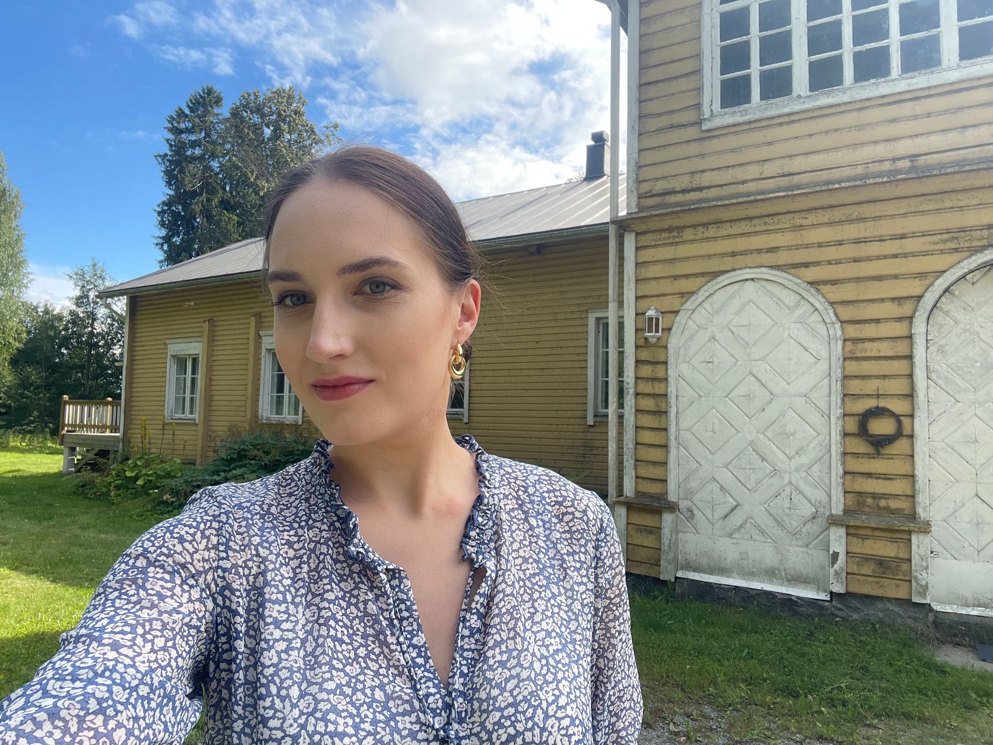 Agata outside the house in Finland where composer Laura Netzel was born
