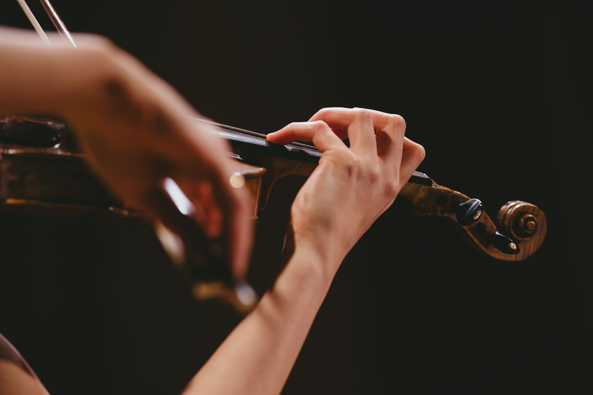 Close view of violin playing hands
